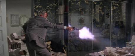 Lee Marvin’s Gray Flannel Suit in Point Blank With a muzzle flash like that, I'd probably assume the gun had a kick to it, too.