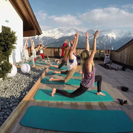 This is how yoga should be done. If you don't happen to have a handy Alpine roof terrace, a village hall will do nicely. Photo courtesy of Anna Langer.