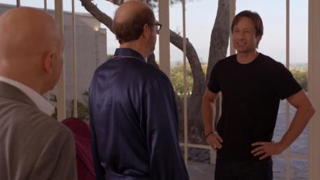 Californication – Hank Moody on a Plane (Season 5) The three men's attire say volumes about their characters: Runkle is a businessman, Stu is sleazy, and Hank is casual. (Note the reversed jewelry for Hank... I'm coming to that.)