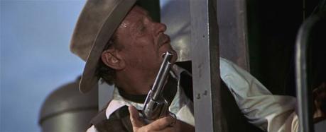 William Holden in The Wild Bunch Gun safety advocates may criticize Pike's finger on the trigger of his revolver, but the hammer isn't cocked and Pike likely follows the Old West tradition of keeping an empty round under the hammer anyway.