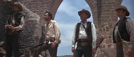 William Holden in The Wild Bunch Tector, Lyle, Pike, and Dutch prepare to take on a town.