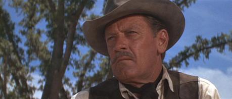 William Holden in The Wild Bunch His kerchief serves as a practical sweat-catcher rather than a flashy
