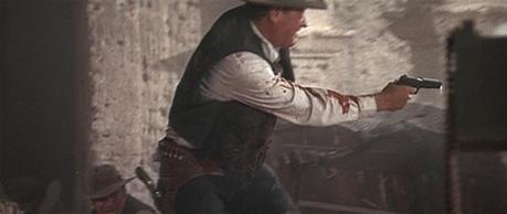 William Holden in The Wild Bunch Pike's on his way to getting his hands on some much more powerful weaponry.
