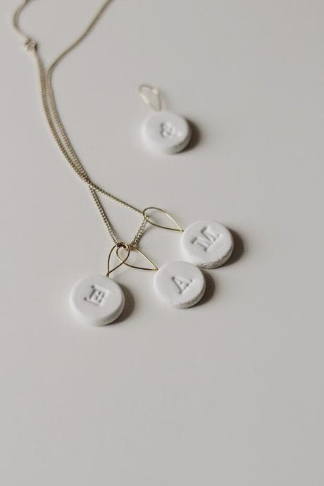 letter stamped clay beads.
