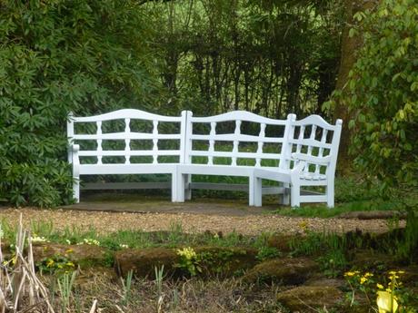 a sociable wooden bench arrangement