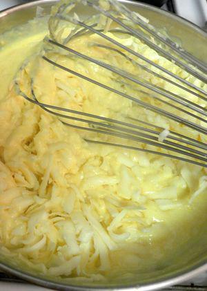 Horseradish Cheddar Souffle - Add grated cheese & whisk