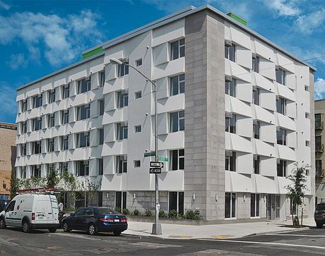 Modern affordable multifamily passive houses like the Knickerbocker Commons in Brooklyn by Chris Benedict with a foam and stucco facade