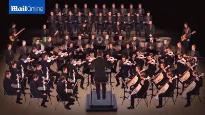 Ultimate selfie: man edits himself into one-man orchestra playing every instrument (and conducting) Ultimate selfie: man edits himself into one-man orchestra playing every instrument (and conducting)