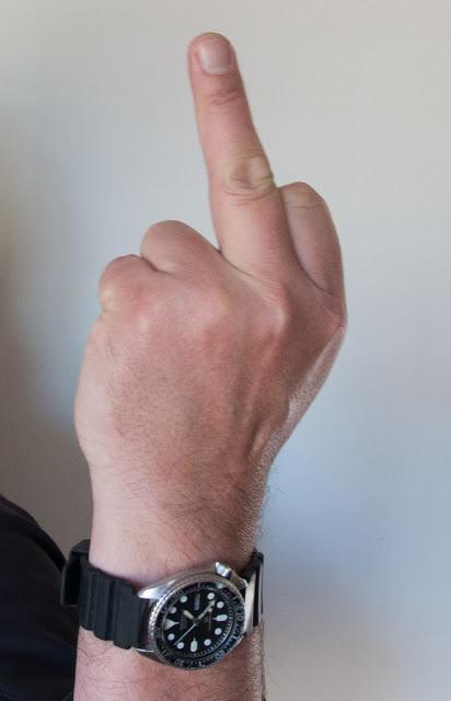 Outrageous showing middle finger