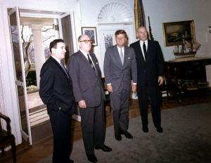 Jerome Wiesner, Joseph McConnell, John F. Kennedy and Harlan Cleveland in the Oval Office. Photograph by Cecil Stoughton. Original held in the John F. Kennedy Presidential Library and Museum, Boston.