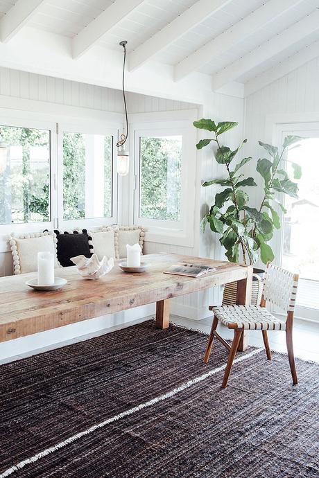 A little texture can go a long way! Light colored wood dining table