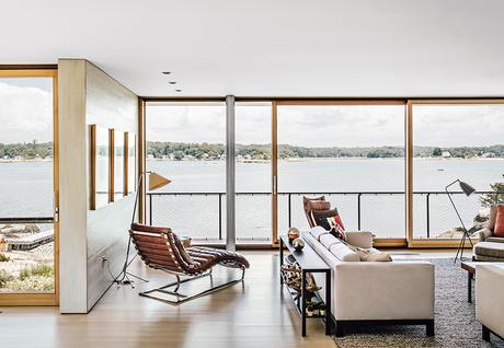 5 Examples of Lounge Chair Style Modern Connecticut summer home renovation with Desiron sofa and Restoration Hardware chaise lounge in the living room