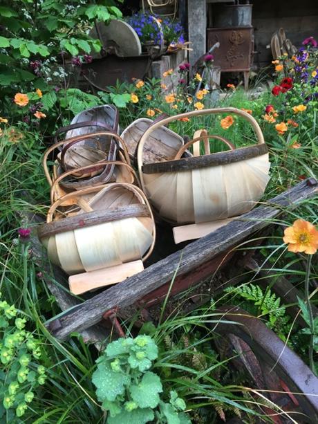 More Shopping at the Chelsea Flower Show stack of trugs on display