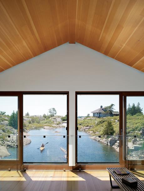 worple house floating house pitched roof windows lake