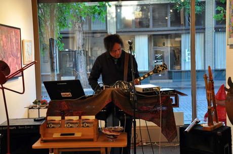 Multi-instrumentalist Tony Kalhagen performing during June 2015 First Thursday opening at Attic Gallery