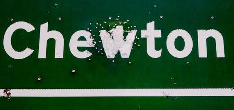 road sign with bullet holes