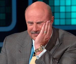 Dr. Phil listening to Randy, Paula, Clay, William and Kelly