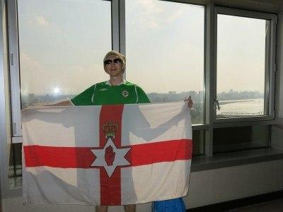 Staying at the 5 Star Yanggakdo Hotel in Pyongyang, North Korea Flying the Northern Ireland flag in the hotel