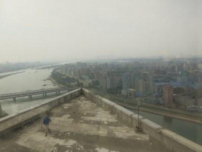 Staying at the 5 Star Yanggakdo Hotel in Pyongyang, North Korea The balcony with a view of the Yang from floor 46