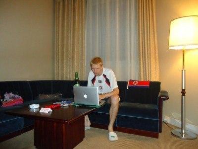 Staying at the 5 Star Yanggakdo Hotel in Pyongyang, North Korea Blogging with a beer in my bedroom