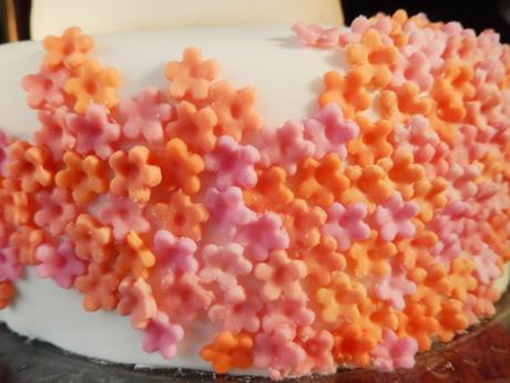 orange and pink wedding cake fondant flowers cascade