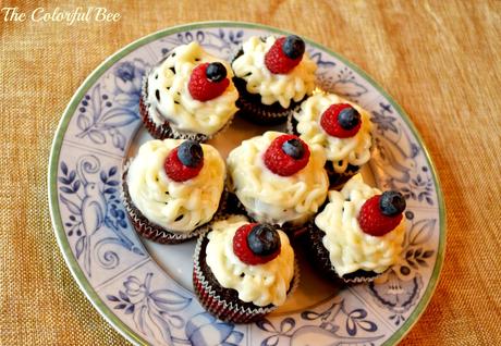 July 4th: History, Fun, Family and Some Recipes devil's food chocolate cupcakes with cream cheese icing and blueberry and rasperry decoration