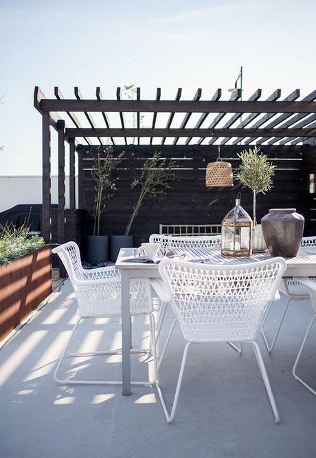 Easy outdoor upgrade Great black timber pergola with white outdoor furniture. Pinned to Garden Design - Pergolas by Darin Bradbury.