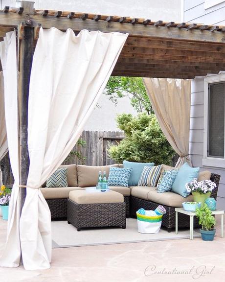 Easy outdoor upgrade Easy outdoor curtain diy tutorial made from Lowes' canvas drop cloths and grommets! We could also add corner seating like this, where the hot tub will someday(hopefully) go. then move it out to the extra patio pad when that happens...