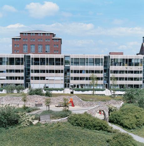 inner-harbor-development-exterior-grounds The NF1 apartment building where Carsten Cox lives has an inner garden, in which fanciful Park Guell–inspired structures utilize the rubble of the buildings demolished to make way for it.