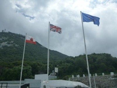 Backpacking in Gibraltar: Top 10 Sights at the Top of the Rock Gibraltar Flag, British Union Flag and EU Flag together