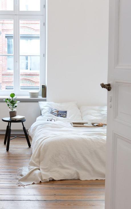 Looking for something new? Scandinavian Style. The minimalistic addition of a stool and plant is striking.