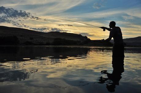 Kevin in his element: fly fishing as sunset.