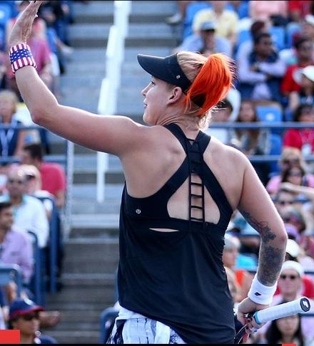 the feats of Martine Hingis .... and the colours of Bethanie Mattek Sands