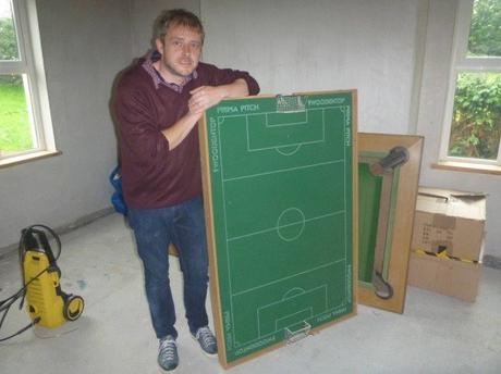 Backpacking in the People’s Republic of Podjistan: All You Need to Know About This Wacky Country Mr. Stewart with his Subbuteo pitch - it's the national sport in Podjistan