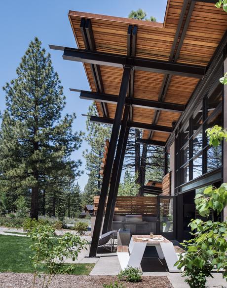 5 Outdoor Dining Areas We Love Bancroft residence awning and picnic table