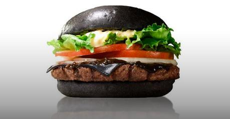 Grotesque magician trick with a black bun Burger King burger. “Observe; the bun is presently black—now I consuuuuuume the burger...”
