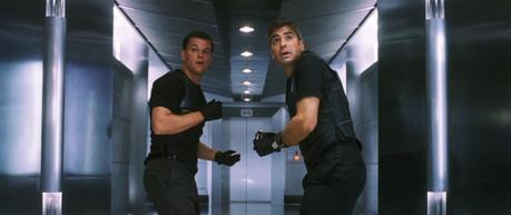 George Clooney’s Tuxedo in Ocean’s Eleven Luckily for Danny, his formal trousers still look pretty good with his tactical t-shirt and vest.