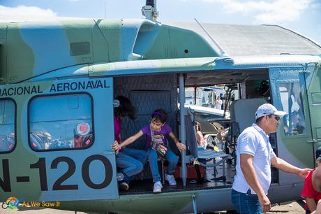 Children aboard a national guard helicopter.