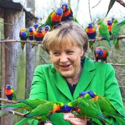 German Chancellor Angela Merkel ~lories parrots ... migrant crisis