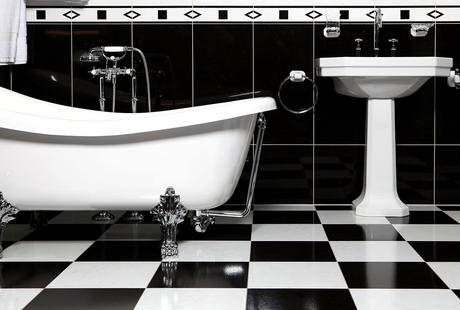 bathroom sink bath tub flooring black white remodel tips how to advice subfloor