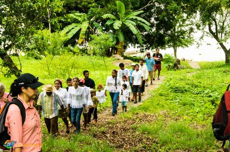 Campesinos walk on a trail in Panama