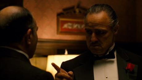 Don Corleone (Marlon Brando) speaks to Bonasera (Salvatore Corsitto)