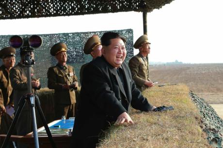 Kim Jong Un watches live fire anti-air rocket drills (Photo: Rodong Sinmun).