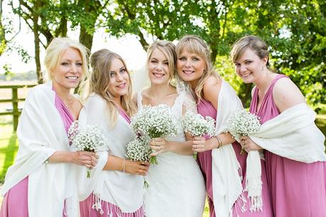 Bride with bridesmaids wearing pink Barmbyfield Barn Wedding Photography