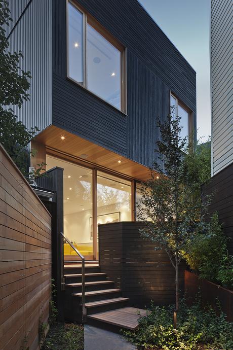 Black wood facade of Toronto renovation by Modern Nest Design + Construction.