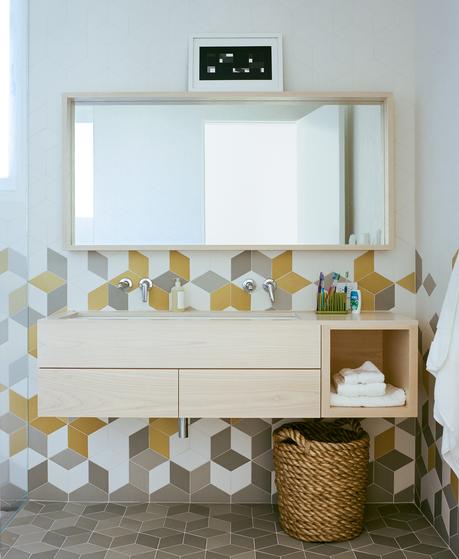An Idyllic Rhode Island Summer Cottage Is the Perfect Escape for a New York Family Colorful tex tiles from Mutina in bathroom of Rhode Island family vacation home by Bernheimer Architecture.
