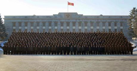 Kim Jong Un poses for a commemorative photograph with senior managers and personnel involved in the DPRK's fourth nuclear test (Photo: Rodong Sinmun).