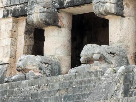Serpent head statues at Chichen Itza