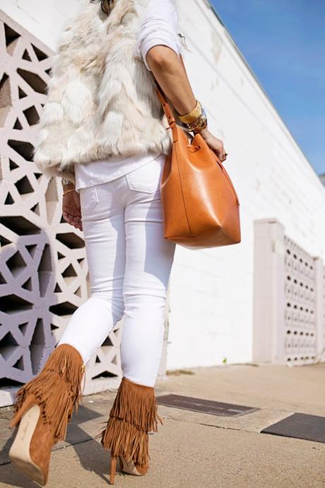 white faux fur vest, sam edelman belinda boots, mansur gavriel bucket bag, how to wear winter white and tan