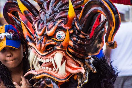 One of the diablos poses for a photo during Panama Carnival.